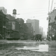 A downtown Detroit intersection in 1915, with a crow’s nest-style traffic stand that’s topped with a stop sign, via Detroit Historical Society